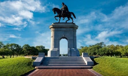 black horse statue under blue sky during daytime